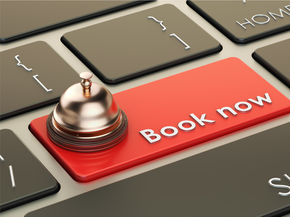 Book now button symbolizing online appointment scheduling for acupuncture and wellness care.